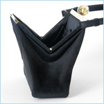 black suede handbag with quilted chevron detail 