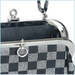 black and metallic silver checked bag