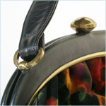 Rosenfeld handbag with abstract, floral print velvet sides 