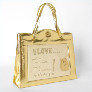 gold handbag with I Love and I Hate themes 