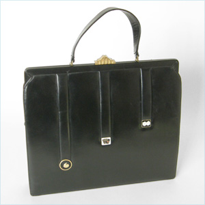Sizable, black leather bag with ribbon detail