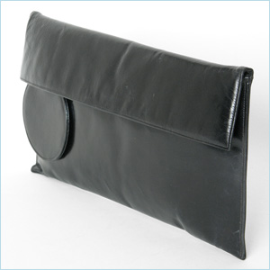 Minimalist, black leather clutch with flap closure