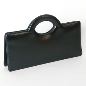 black leather bag with simple, modernist style and cut out handles