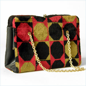 Bold, op art patterned velour handbag