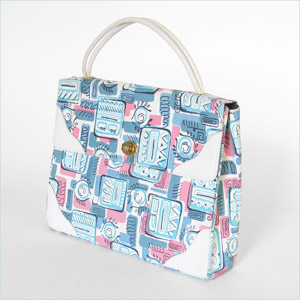 Finely woven straw handbag with pink and blue